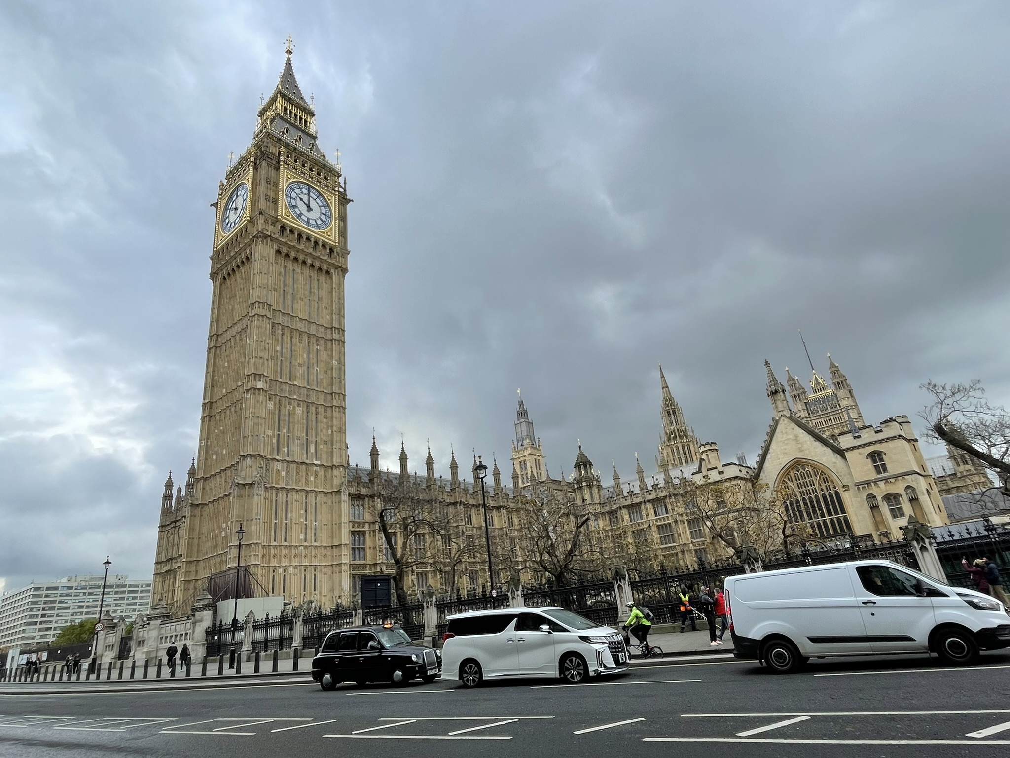 The Elizabeth Tower and Big Ben clock face against a London sky.
