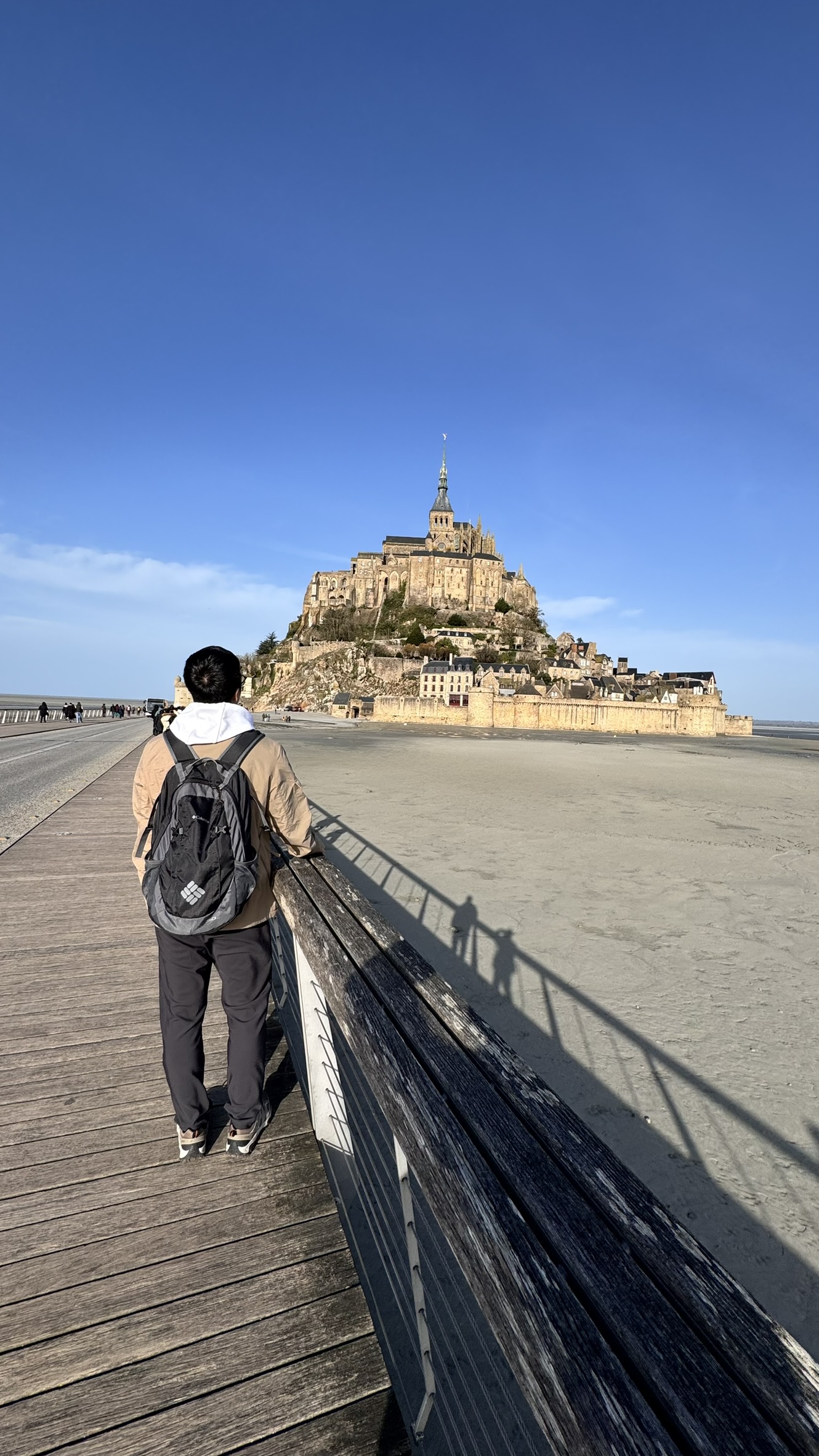 The medieval island abbey of Mont Saint-Michel rising above the tidal flats in Normandy, France.